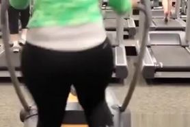 Woman in tight sports pants exercising