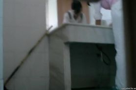 Toilet spy camera catches a cute Asian chick taking a piss.