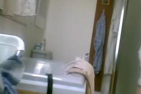 Hairy wife spied in bathroom after shower