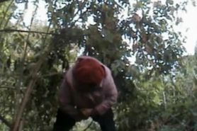 Chubby granny caught pissing outdoors