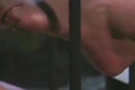 Nicole Sheridan puts slave in cage