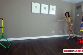 Two beautiful ladies strip while playing toss the balls
