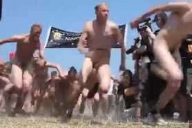 Nudist race with guys and girls running