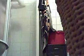 Bathroom spy cam records a blonde pissing and then showering