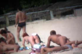 Nudist beach voyeur shoots naked babes sunbathing