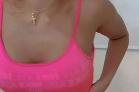 Latina in pink dances and gets naked