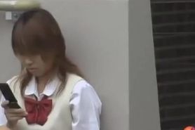 Appealing Japanese schoolgirl getting grabbed by her sweet little boobs