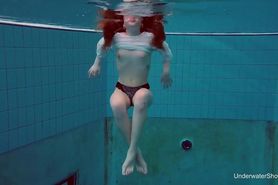 Underwater swimming girl Alice Bulbul
