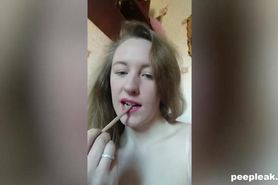Geeky amateur teen toying her large labia with a pencil