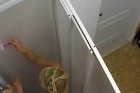 Spying blonde girl's shower orgasm