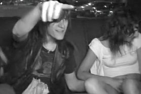 Naughty students fool around in the back of a taxi