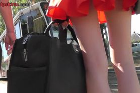 Red head girl wears classic pants in upskirting video
