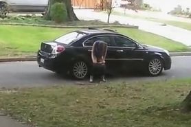 Desperate girl pees on a public suburban street