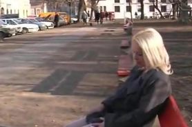 blonde girl peeing in public