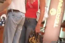 Slim tanned hot brunette with camel toe shopping street candid