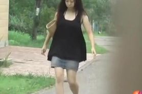 Sharking of an Asian girl wearing no panties under her skirt