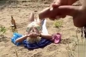 Stroking to tanning woman that does not know it