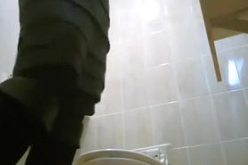 Asiatic women spied in public toilet peeing