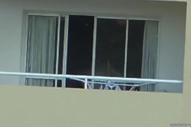 voyeur girl nude in balcony  argentina . far away ( 200 m)