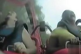 Big boobs bounce during a roller coaster ride