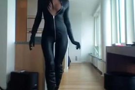 Posing in catsuit and boots