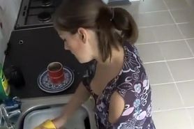 Spy her tits while she does the dishes