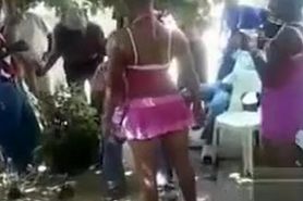 Black prostitute gives a naughty public lap dance