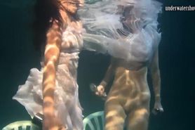 Lesbos from Russia Polcharova and Siskina getting playful in the pool with each other
