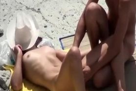 Nude couple fucking in rocky beach
