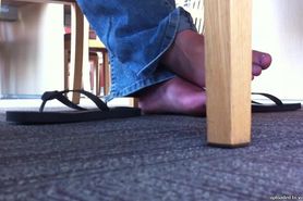 hidden footsie in library,needs time but she likes it