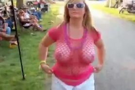 Big boobs biker girl flashes at the park