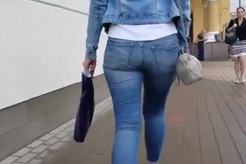 MILF's ass in tight jeans