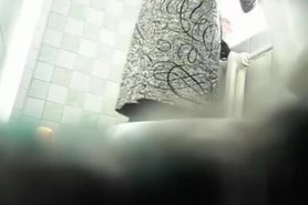 Mature woman spits and pees in toilet