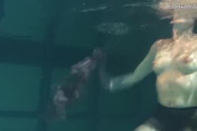 Dressed underwater beauty Bulava Lozhkova swimming naked