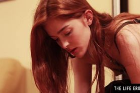 Stunning redhead watches herself in the mirror as she masturbates