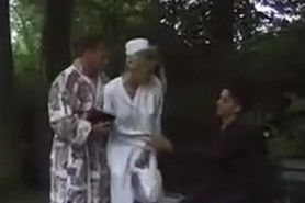 Blonde nurse confronts two horny patients