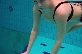Nude girl Vesta shows herself nude underwater
