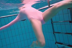Small boobs brunette teen Liza Bubarek swimming in the pool