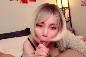 HOT Asian in Sexy Stockings and Suspenders Gives Amazing Blowjob