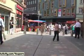sweet naked girl has fun in streets