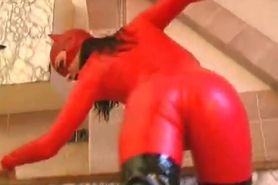 Red Rubbercat in high heels