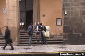 Two guys fuck an old woman
