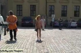 Hot blonde shows her slim body in public