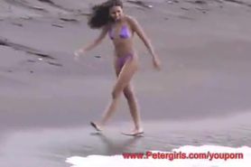 Hawaiian bikini girl on the beach masturbating