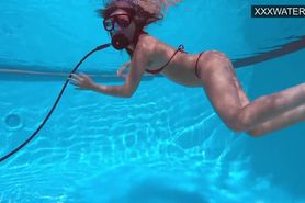 Teenie horny girl Lana uses dildo in the swimming pool