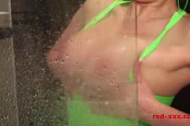 Busty mature redhead RedXXX fucks her dildo while showering