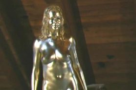 Golden painted Renata showing pussy