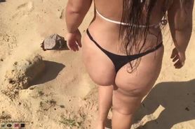 Showing my Plugged Ass and pissing on a public beach