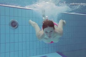 Cute pink bikini girl Lera underwater