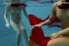 Mega hot and wet lesbos swimming and stripping